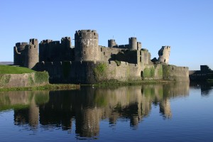 Caerphilly Castle, the largest in Wales and second largest in Britain.  Built by English Lord Gilbert de Clare in  1268 to keep defend against the Welsh,  particularly  Llewellyn ap Gruffudd.