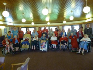 Staff & residents  at Finborough Court wearing colours of the flag to celebrate the Queen's long reign.
